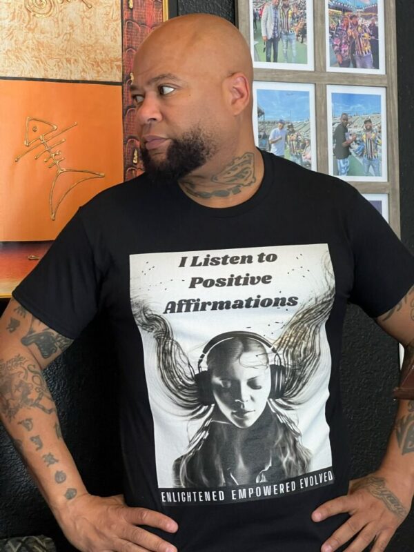 Closeup view of a man wearing printed black t shirt