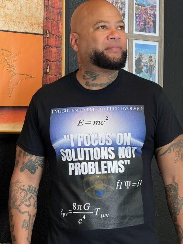 Closeup view of man wearing printed black t shirt